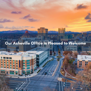 view of Downtown Asheville with sunset and mountain view